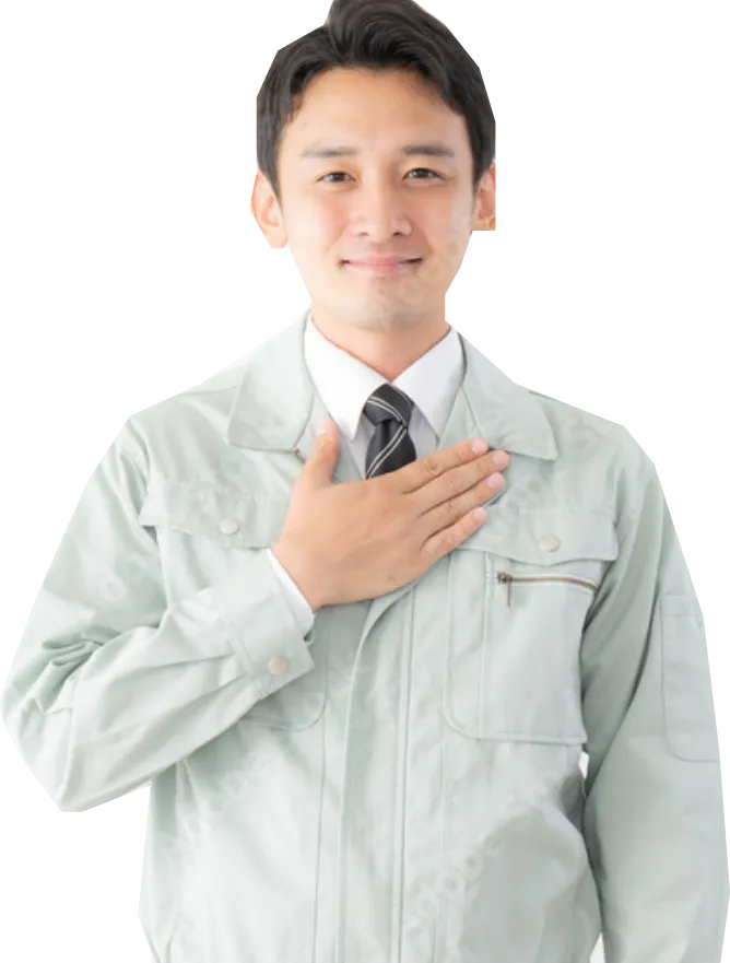 作業着をきた男性が胸に手を当てている様子
